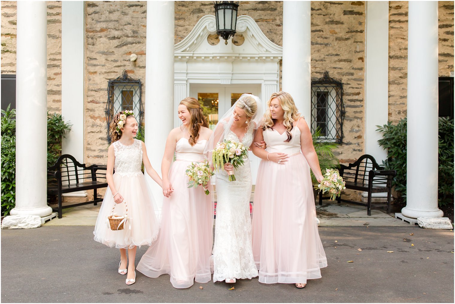 bridesmaids and bride at Huntingdon Valley Country Club photographed by Idalia Photography