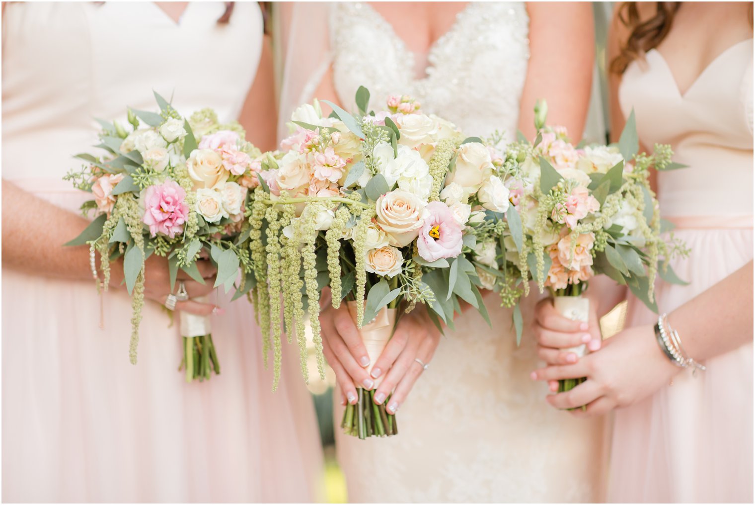 ivory and peach wedding bouquet by Robertson's photographed by PA wedding photographer Idalia Photography