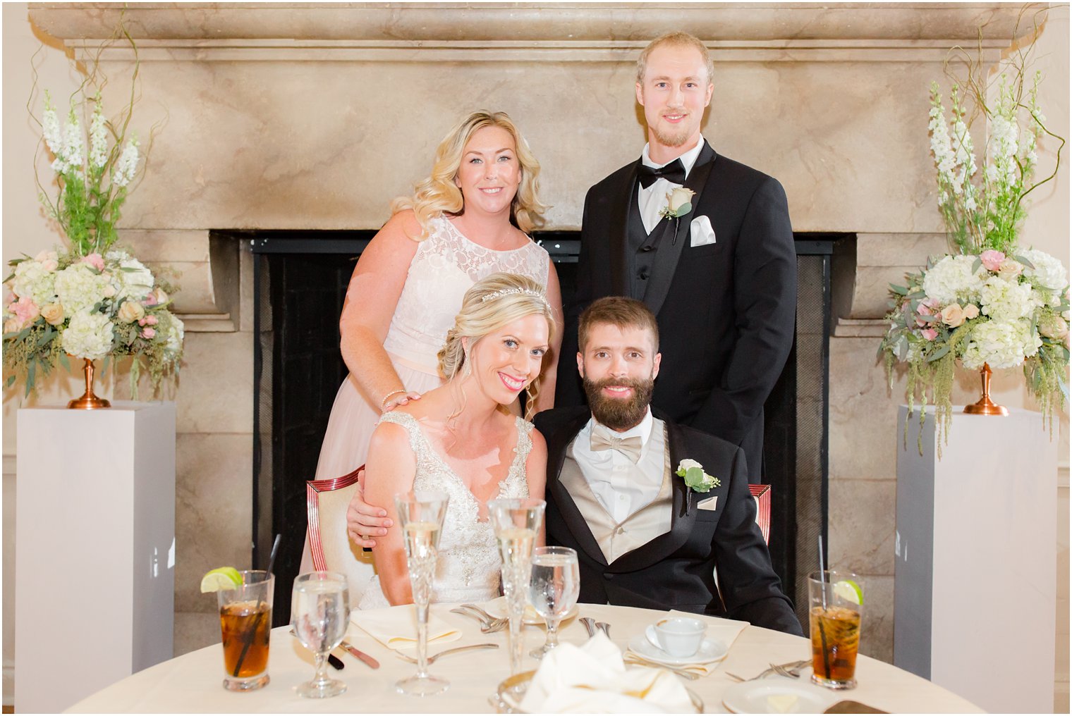 bride and groom with best man and maid of honor at Huntingdon Valley Country Club