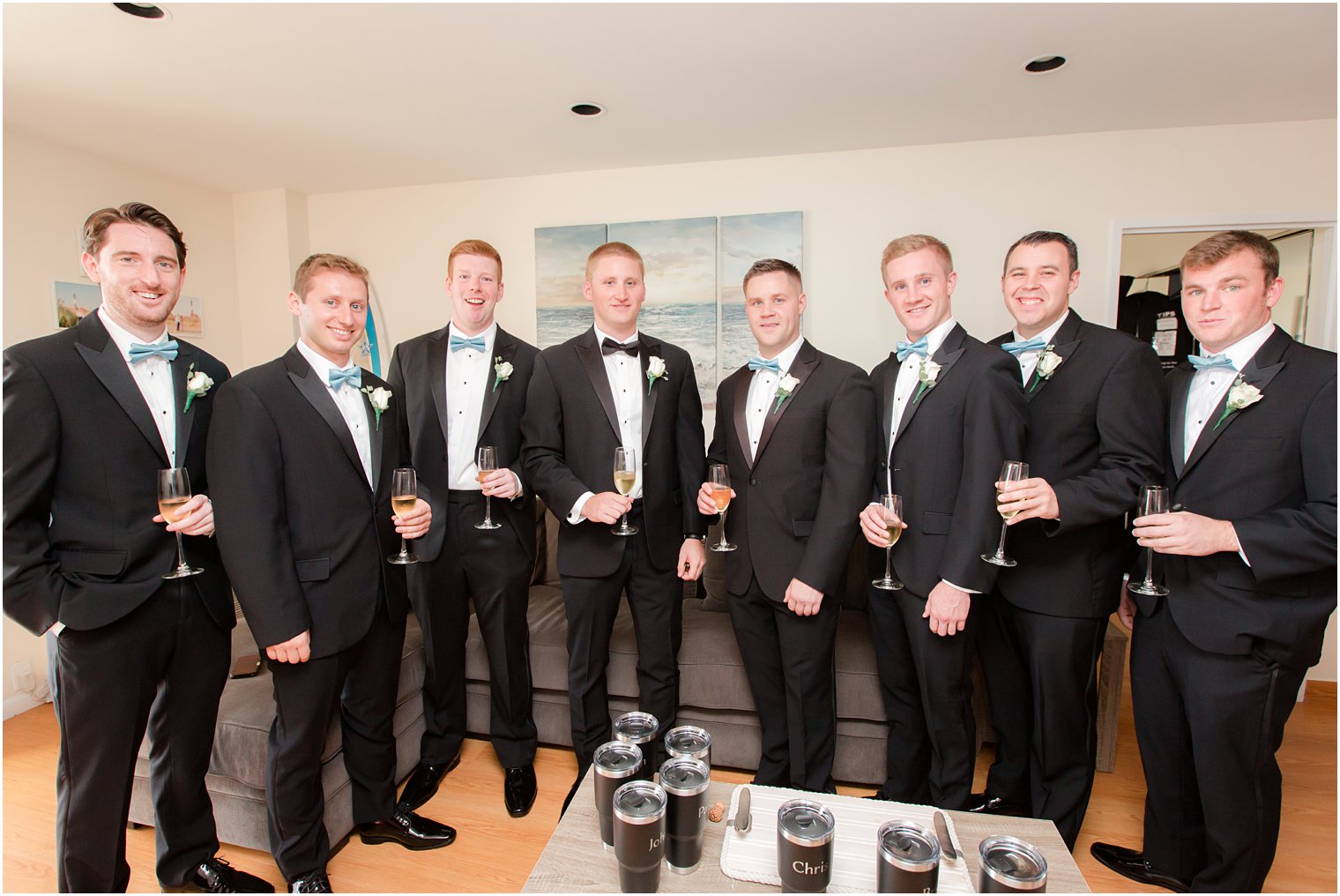 champagne toast with groomsmen photographed by Idalia Photography