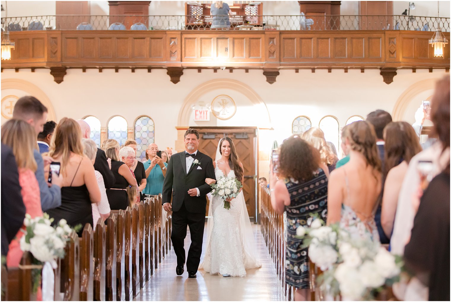 bride walks down the aisle in LBI church wedding