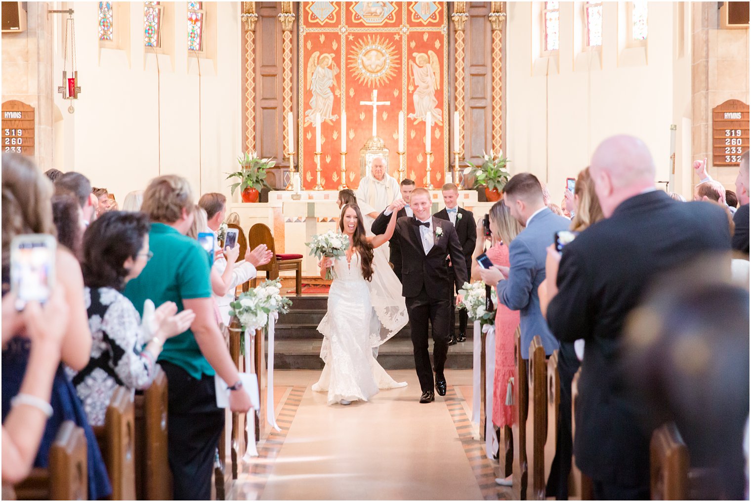 newlyweds leave church photographed in New Jersey