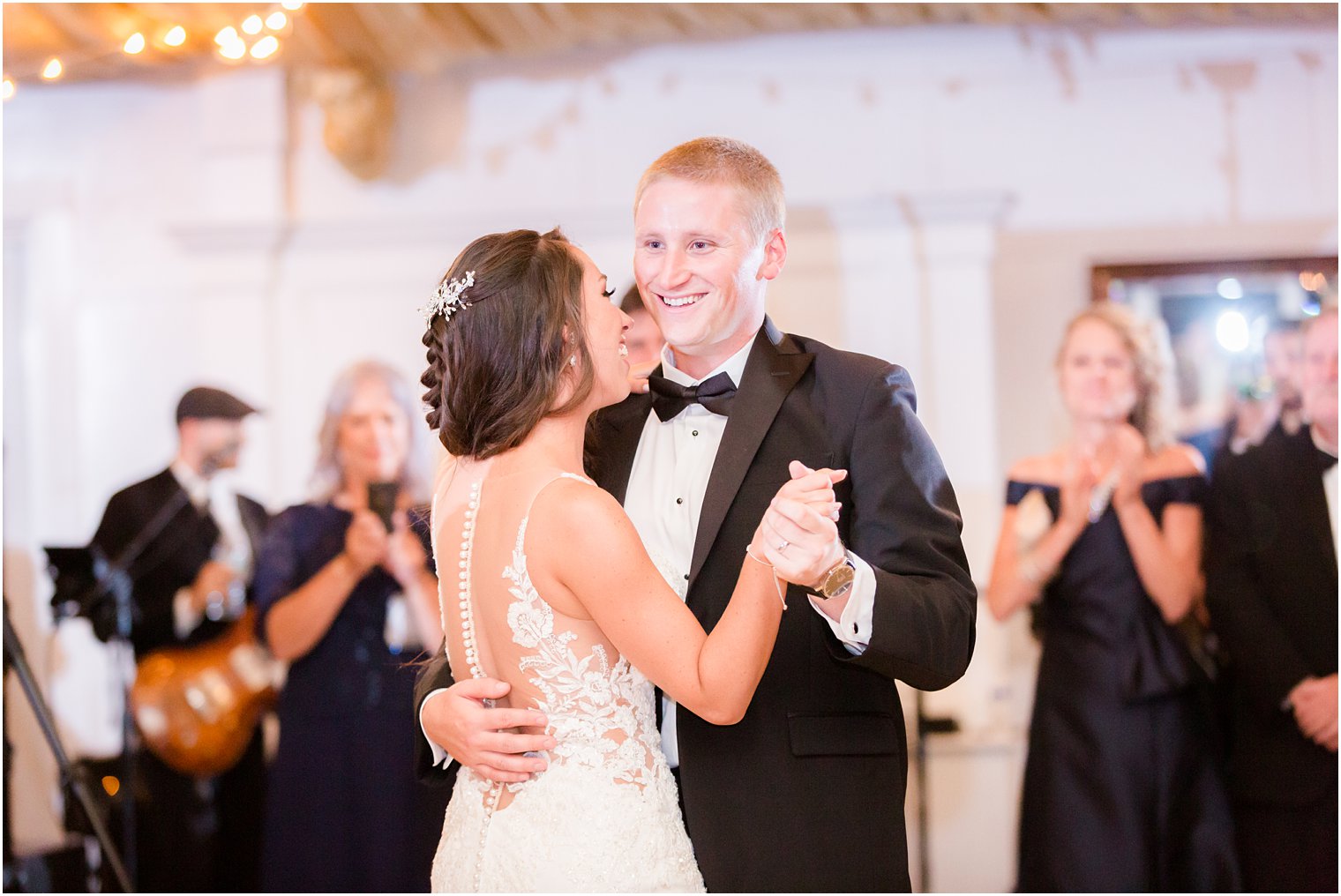 bride and groom dance at wedding reception photographed by Idalia Photography