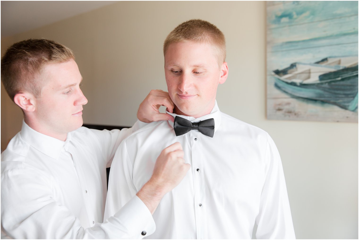 groom prepares for wedding day photographed by Idalia Photography