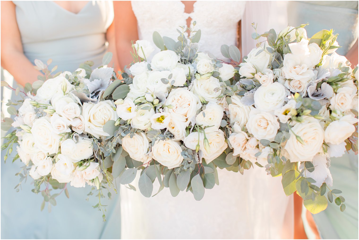 ivory rose and succulent bouquets for beach wedding photographed by Idalia Photography