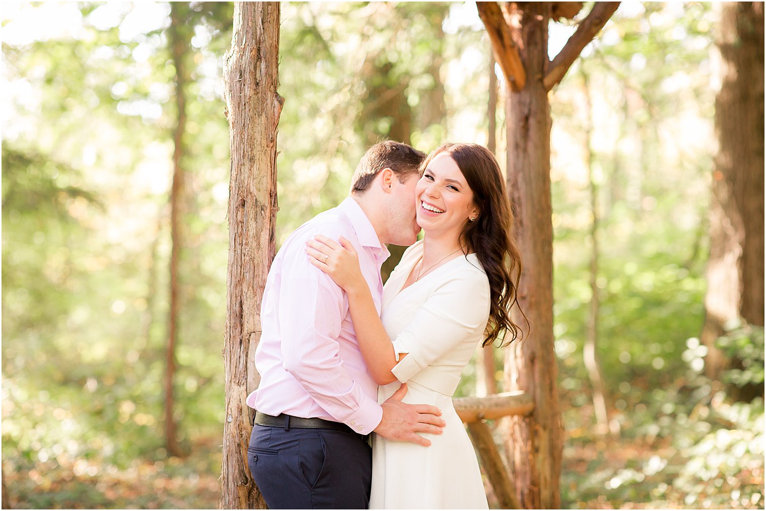 groom makes bride laugh during NJ engagement photos