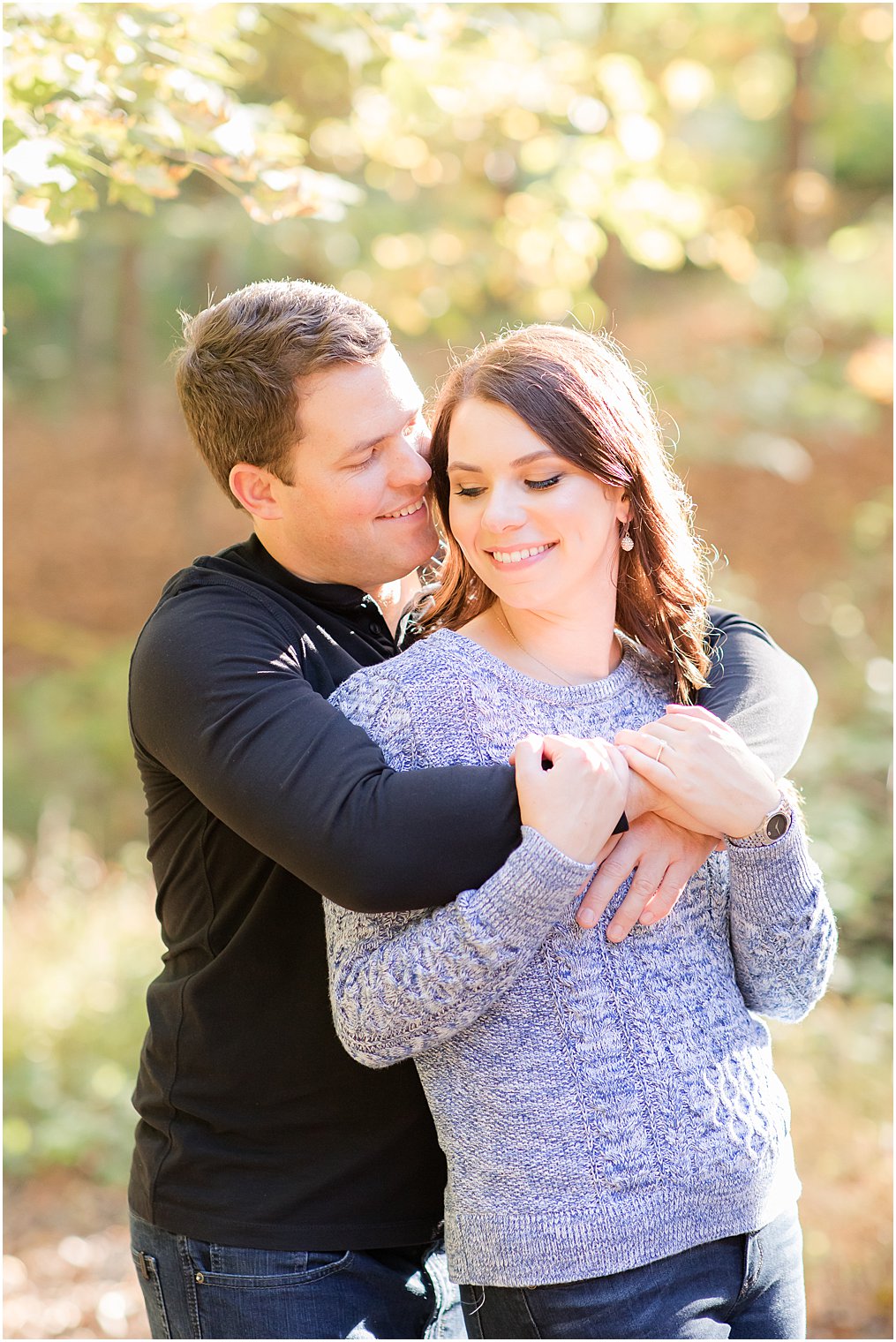 engaged couple hugs during Watchung Reservation engagement session