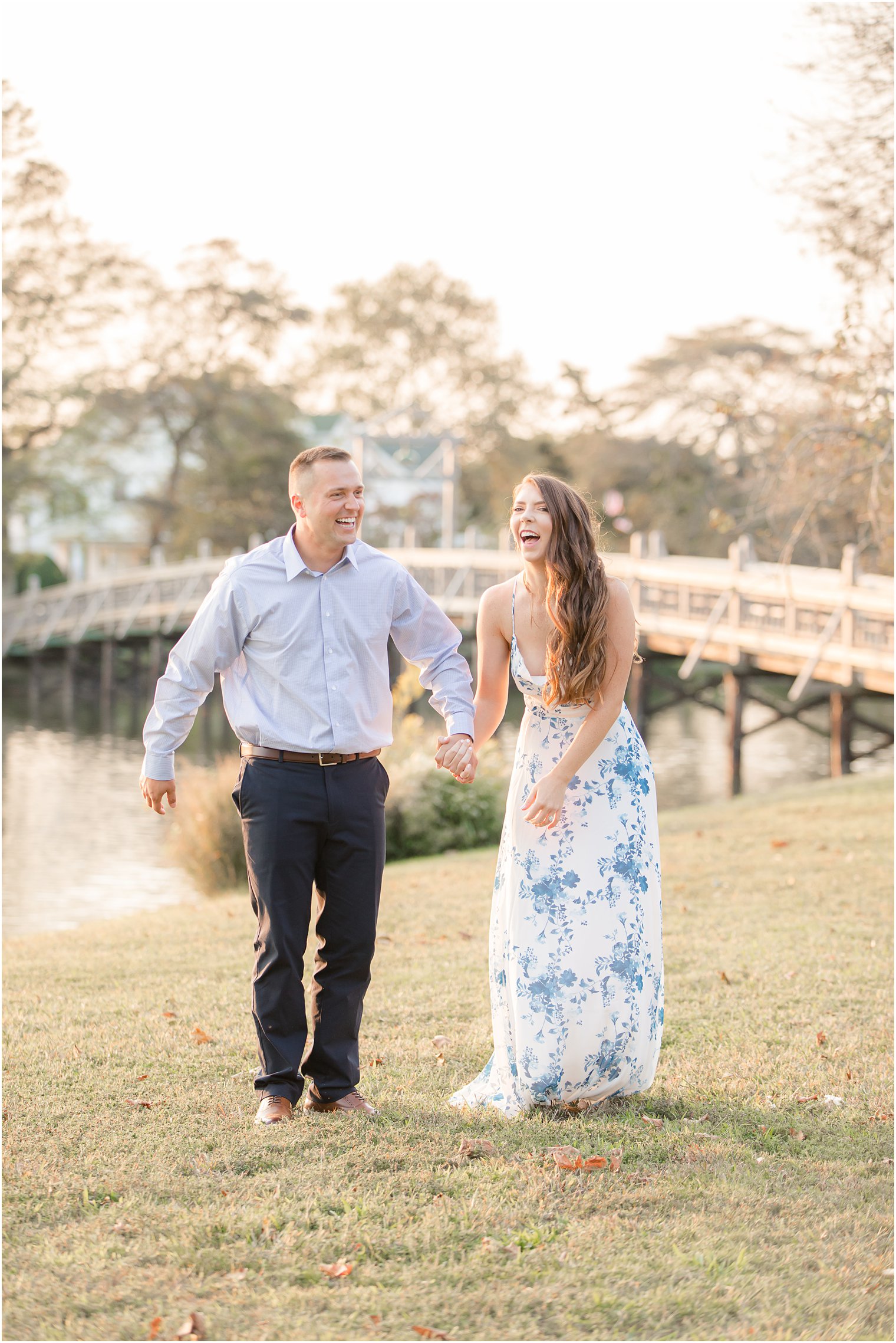 engaged couple laughs during NJ engagement photos with Idalia Photography