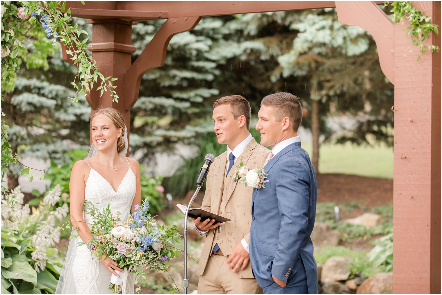 bride and groom read vows during rainy wedding ceremony in Vernon NJ