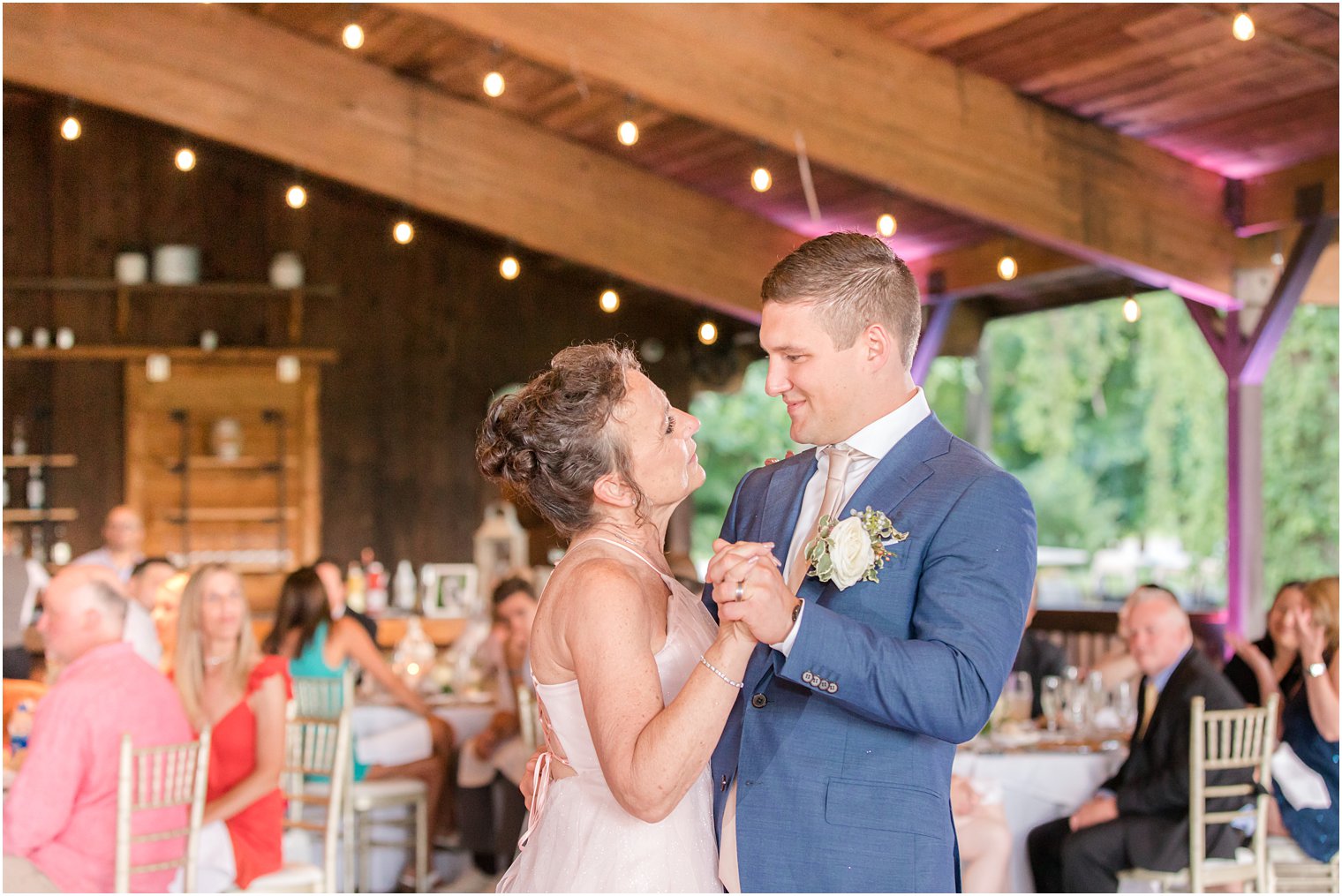 groom and mom dance during Minerals Resort wedding reception 