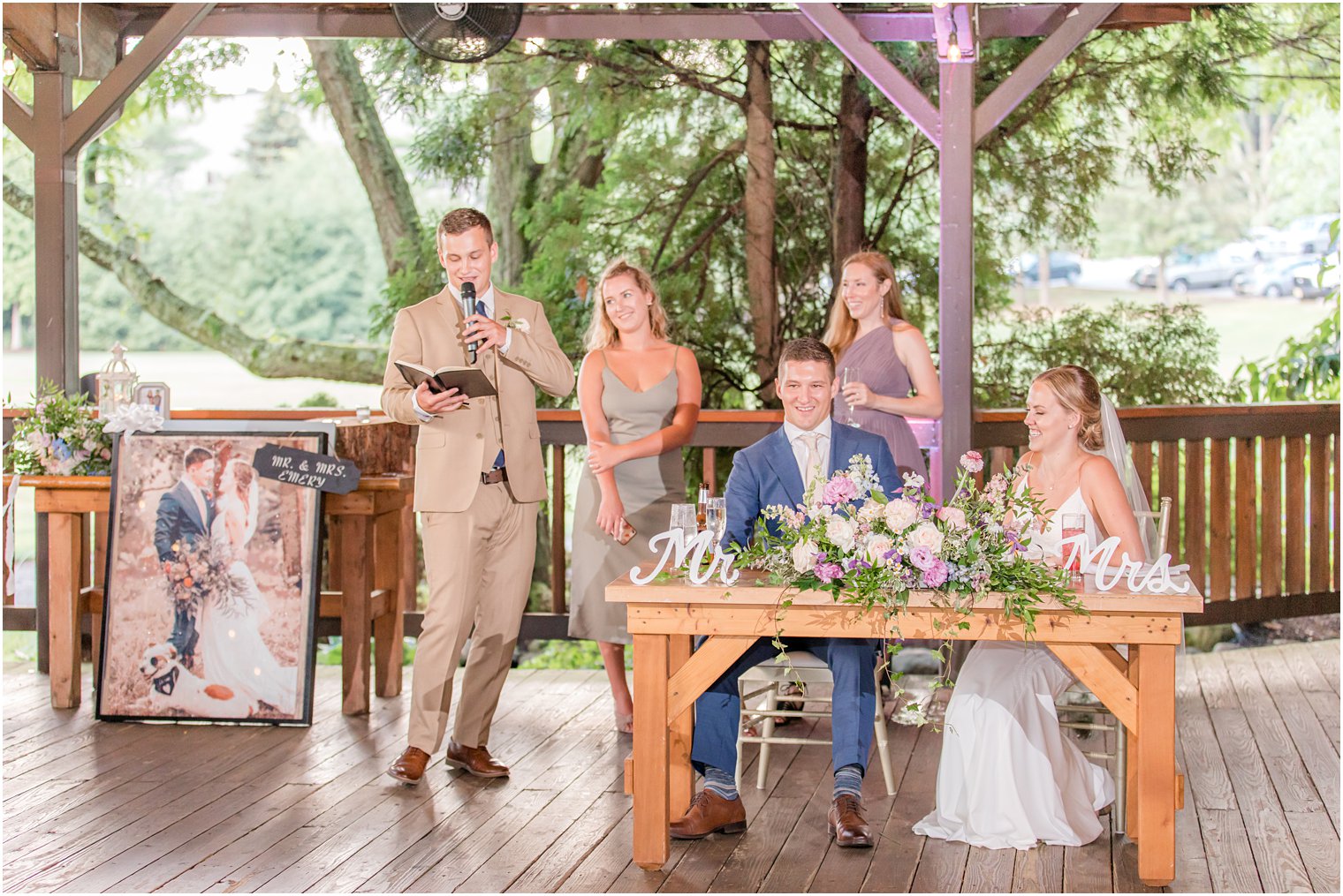 groomsman reads toast during Minerals Resort wedding reception