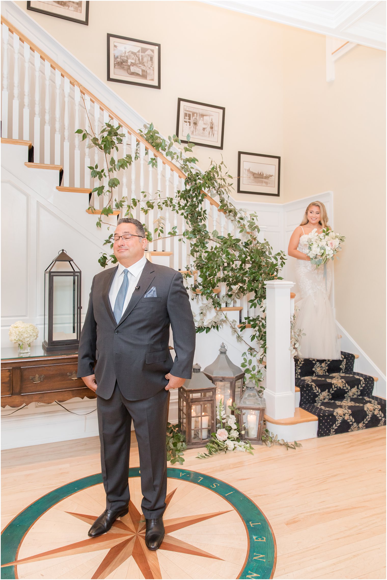 bride walks down steps for first look with dad at Bonnet Island Estate