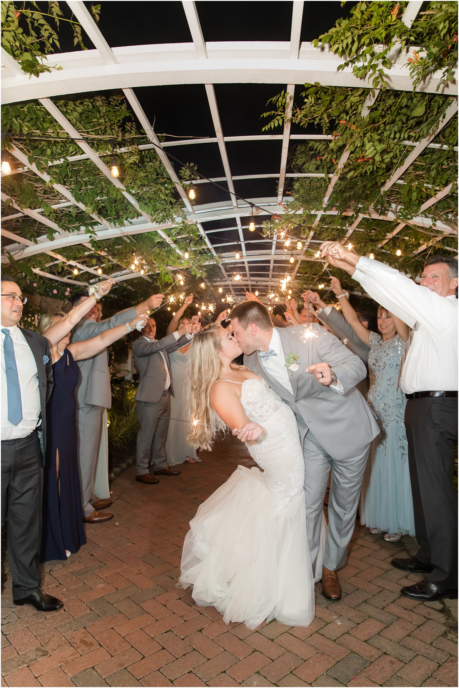 sparkler exit through rose garden at Manahawkin NJ wedding reception