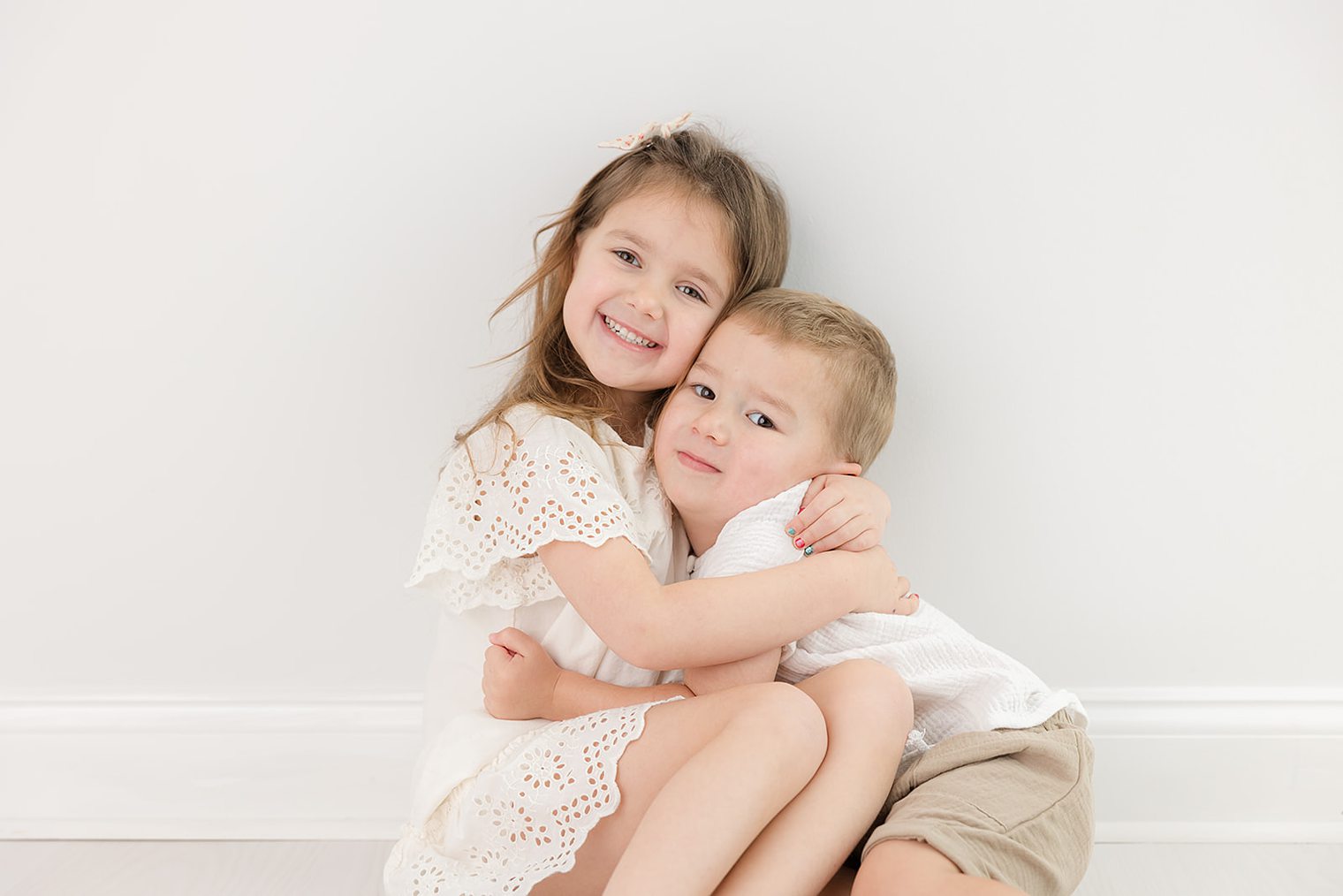 siblings enjoying her oldest sister session 