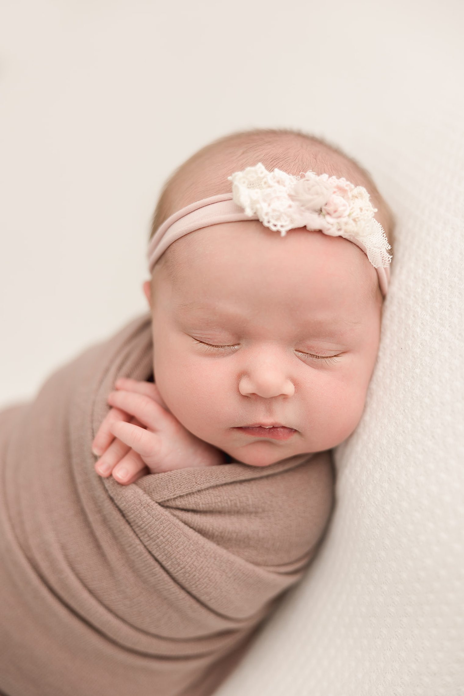 sleepy baby girl in her new born session