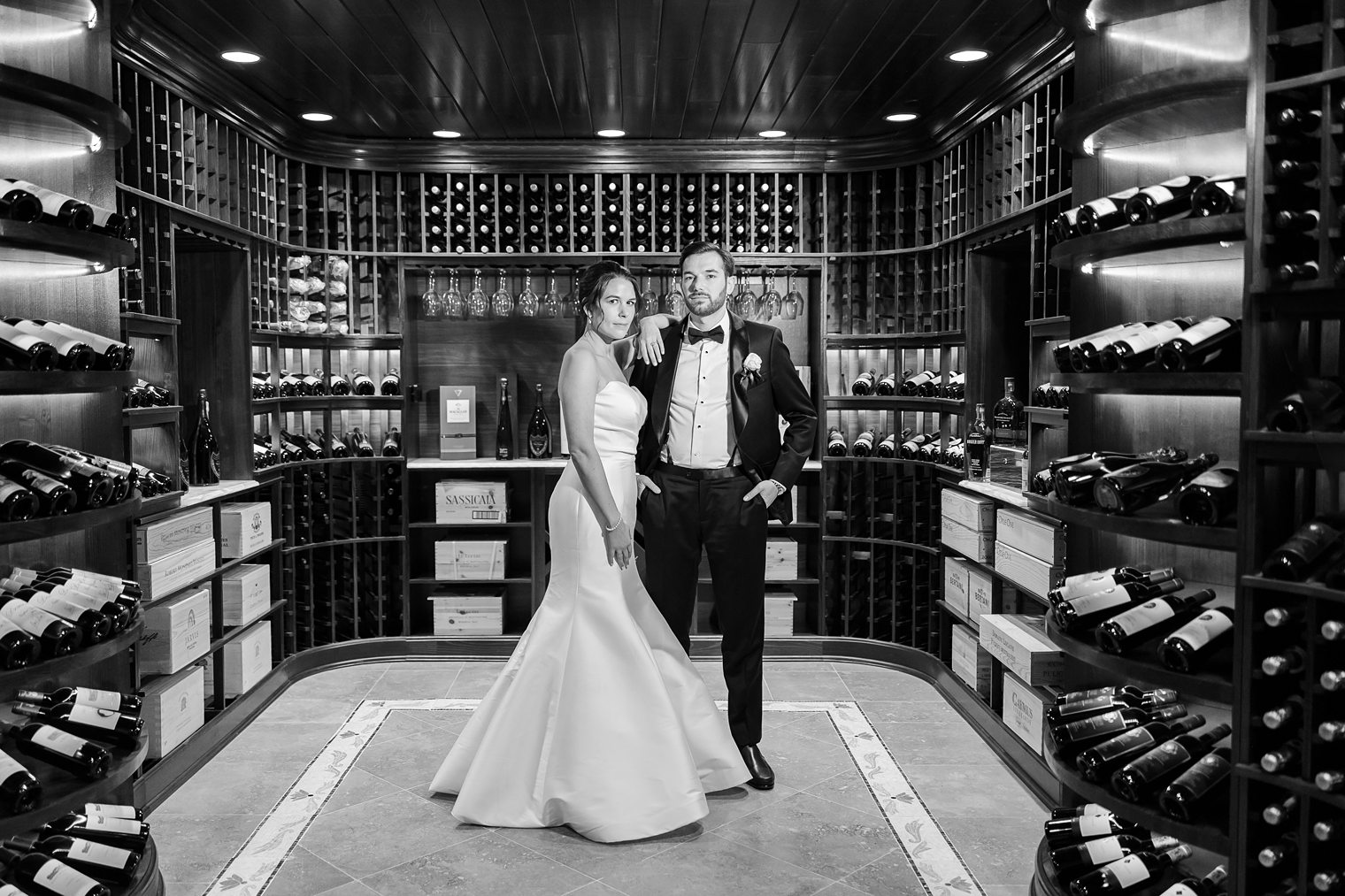 Husband and wife n the wine cellar 