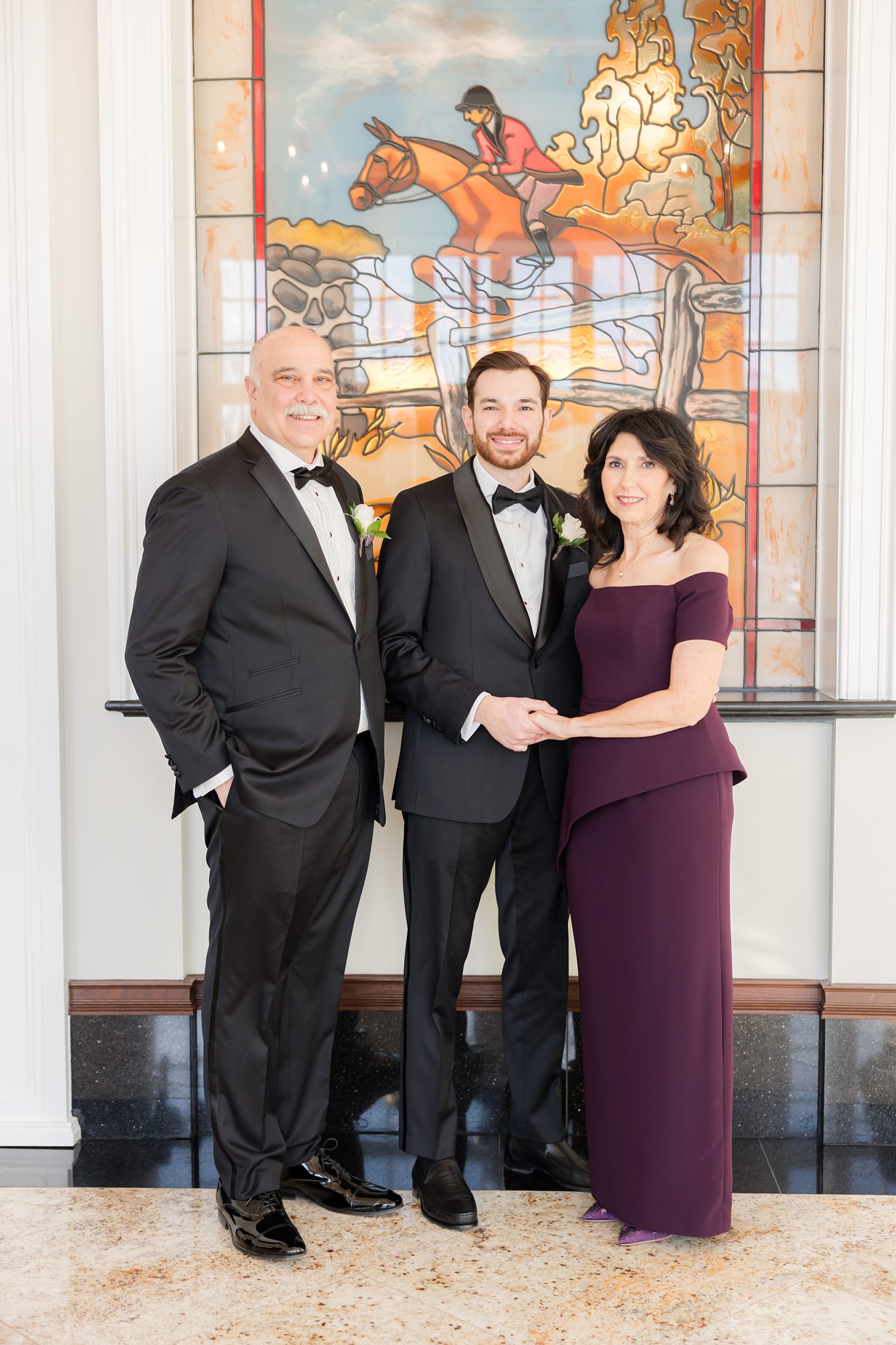 Groom with his parents 