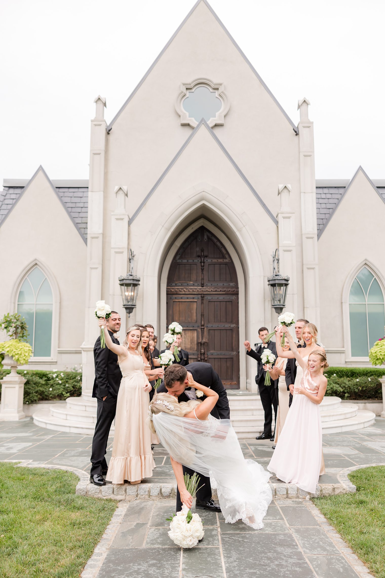 groom and bride kissing 