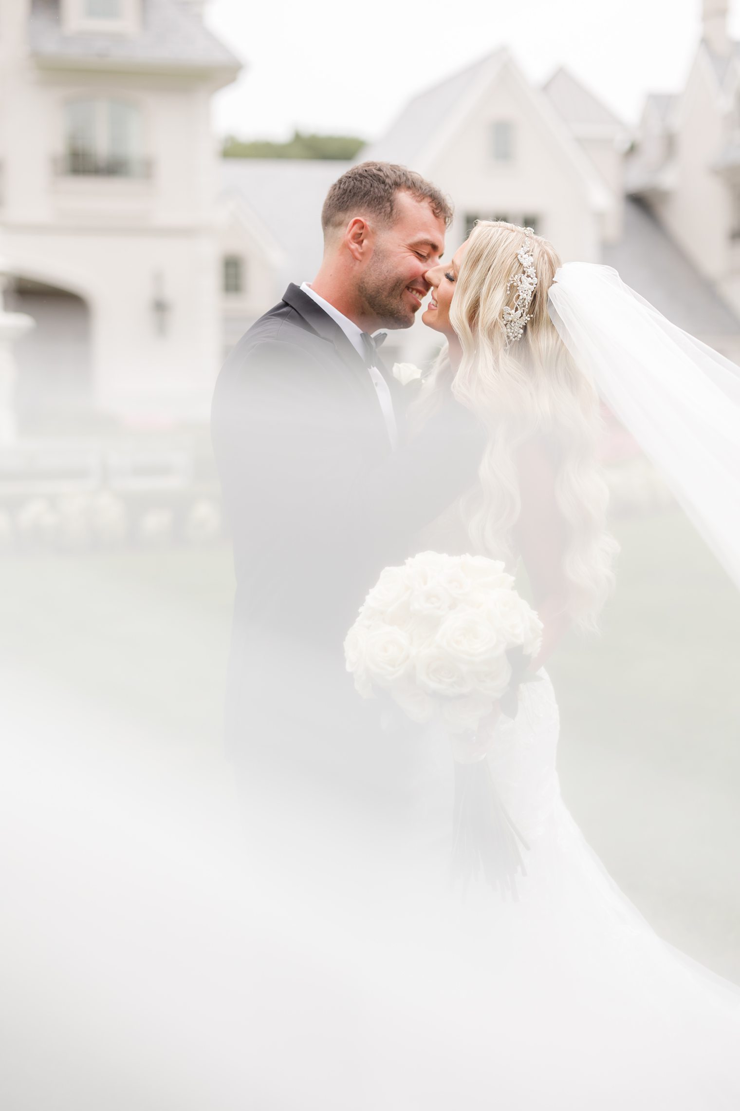 groom and bride sharing a cute moment 