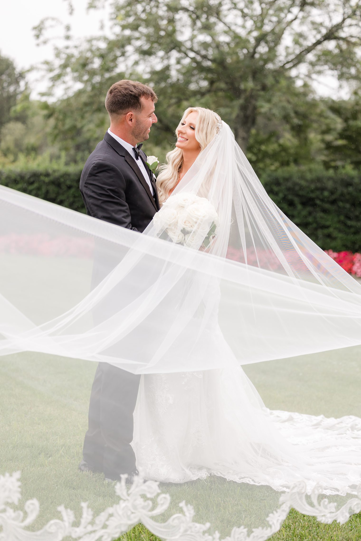 groom and bride looking each other romantically 