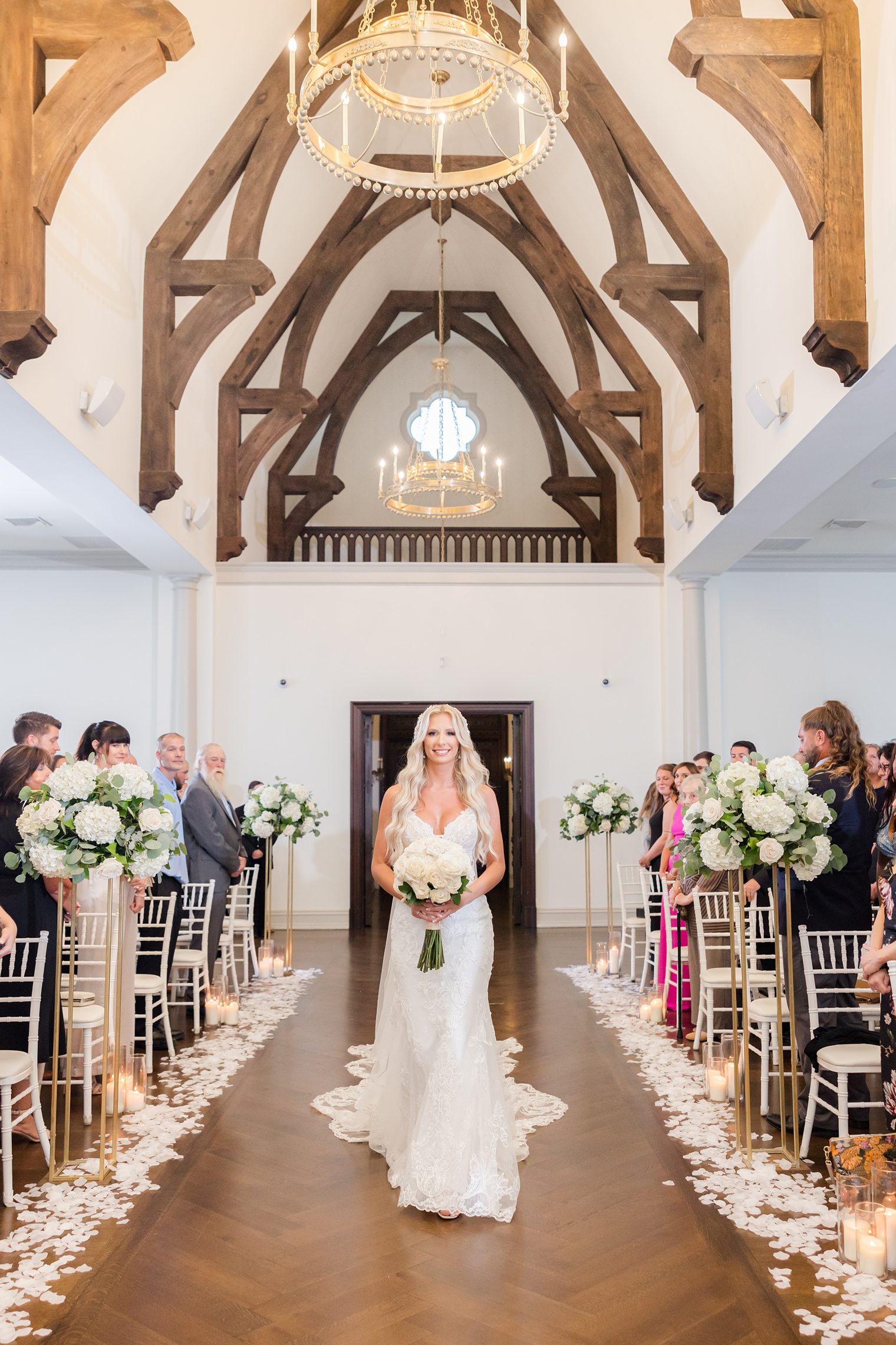 happy bride walking through the aisle 