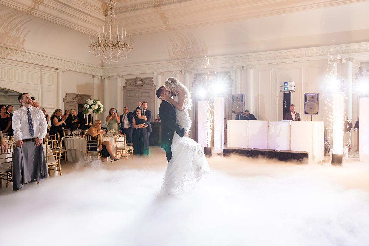 husband and wife sharing a kiss on the dance floor 