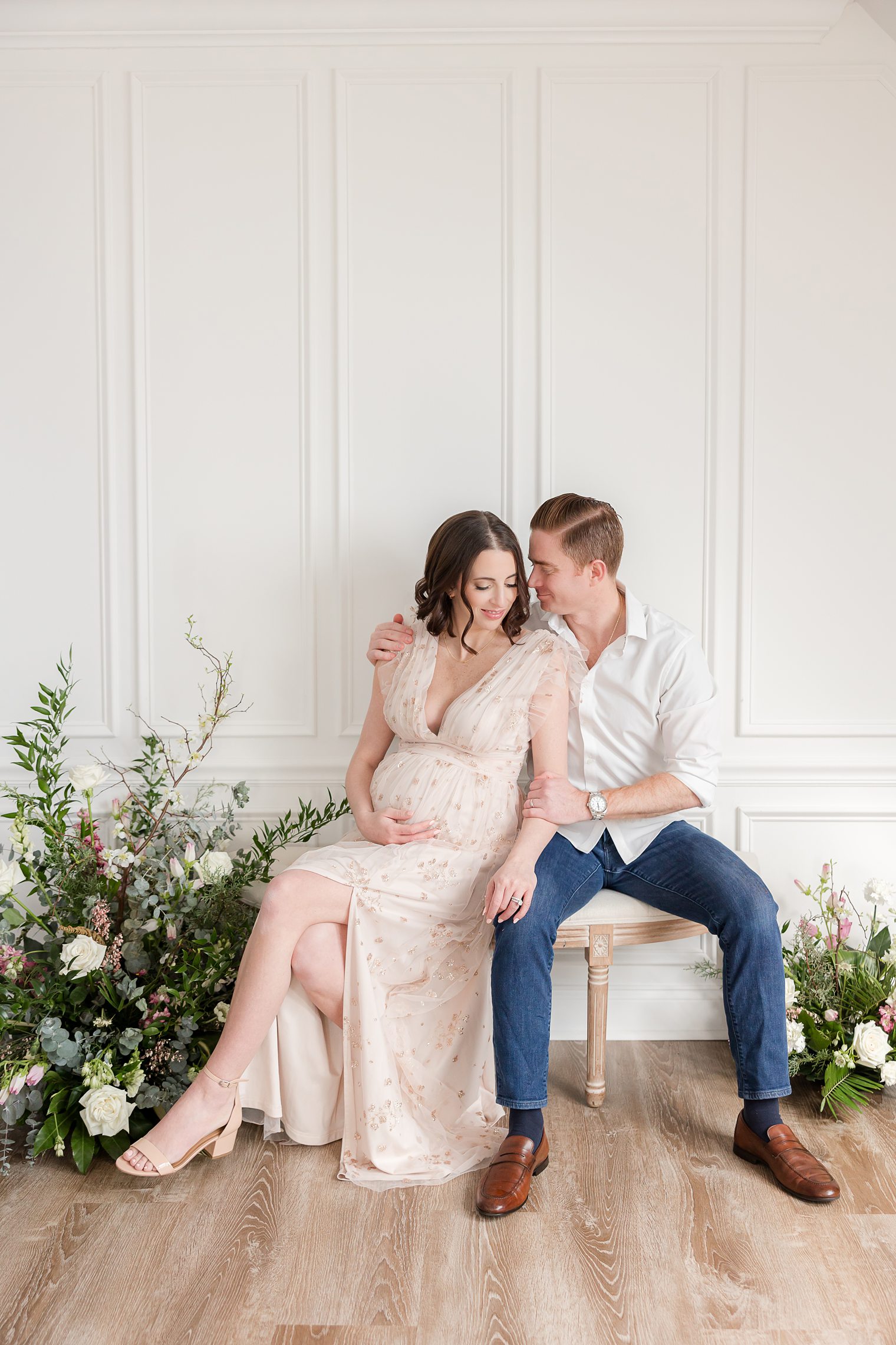 Mom and Dad enjoying their maternity session