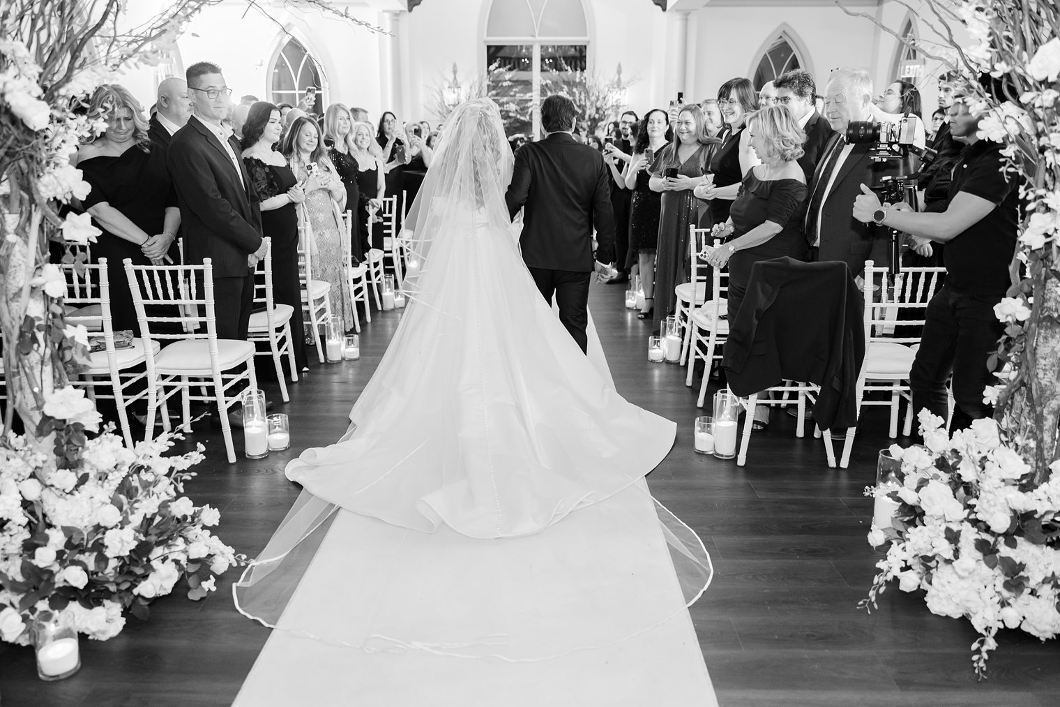 bride walking into the aisle 