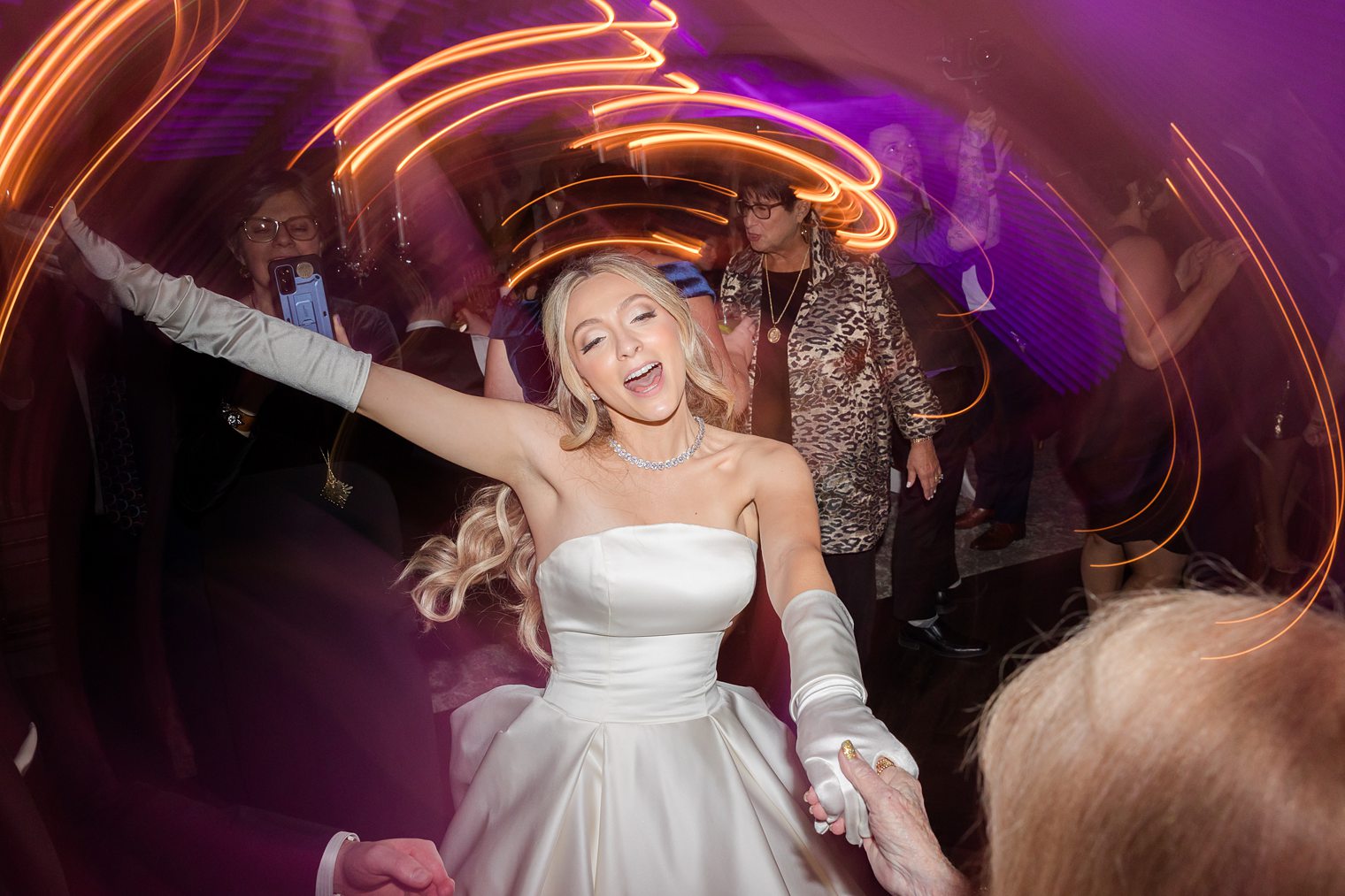 bride having fun at her wedding at Park Chateau 