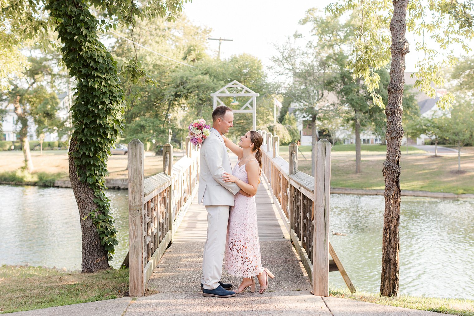 groom and bride sharing a moment at Spring Lake