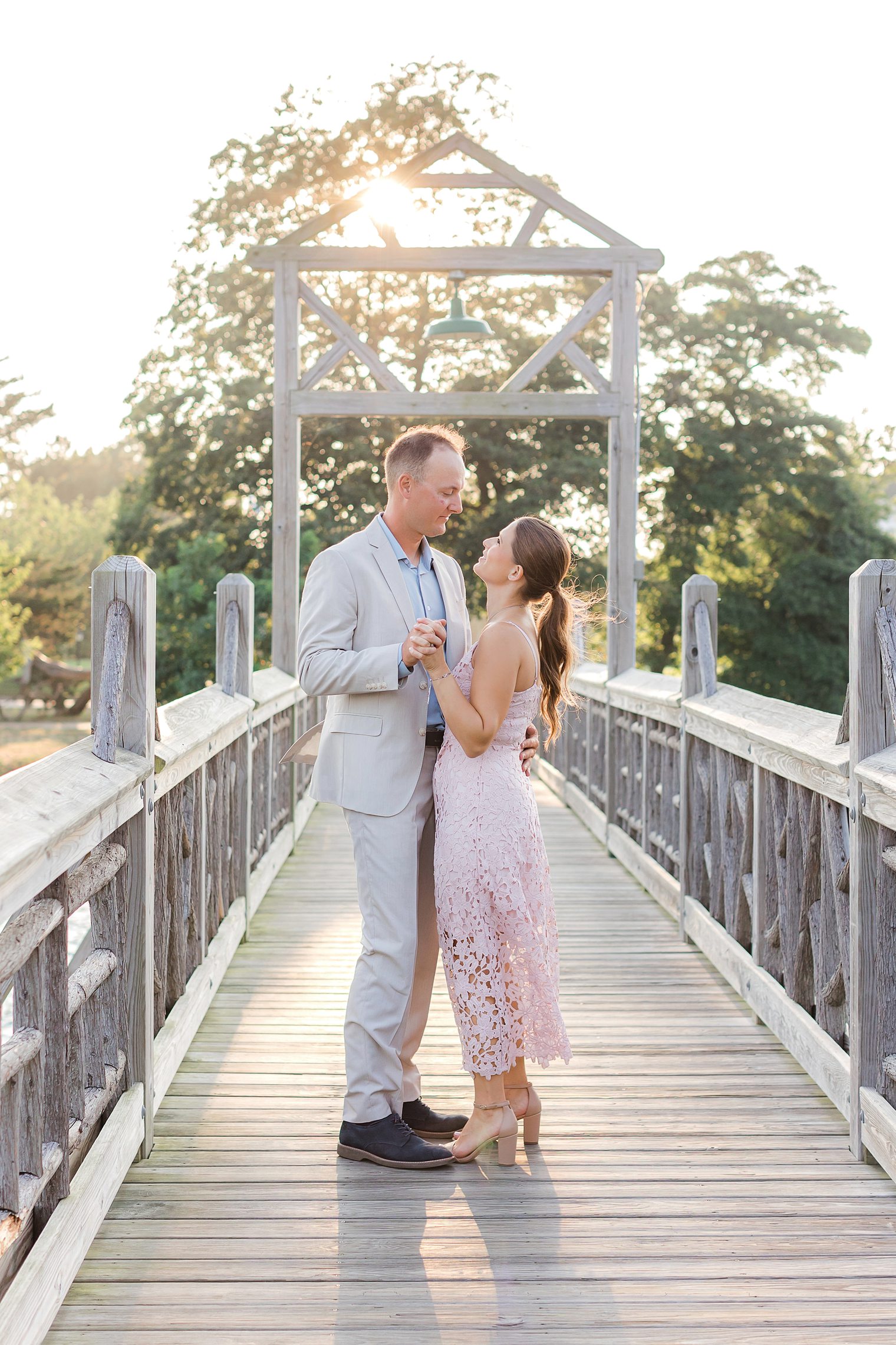 groom and bride dancing at their engagement session 