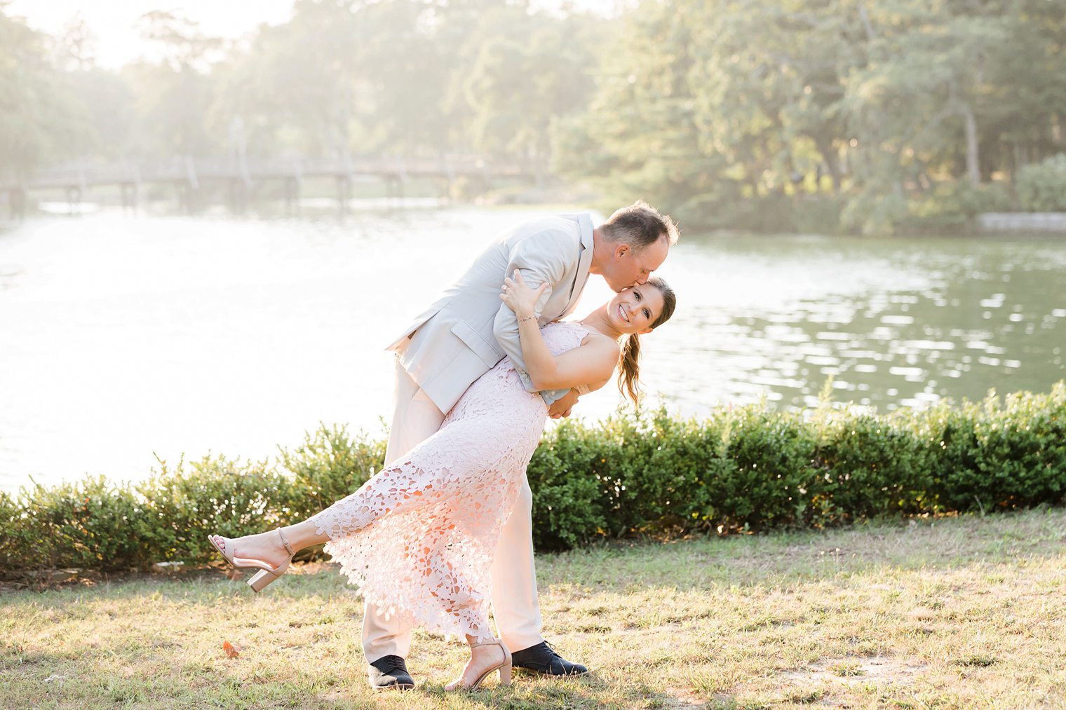 groom kissing his bride's cheek 