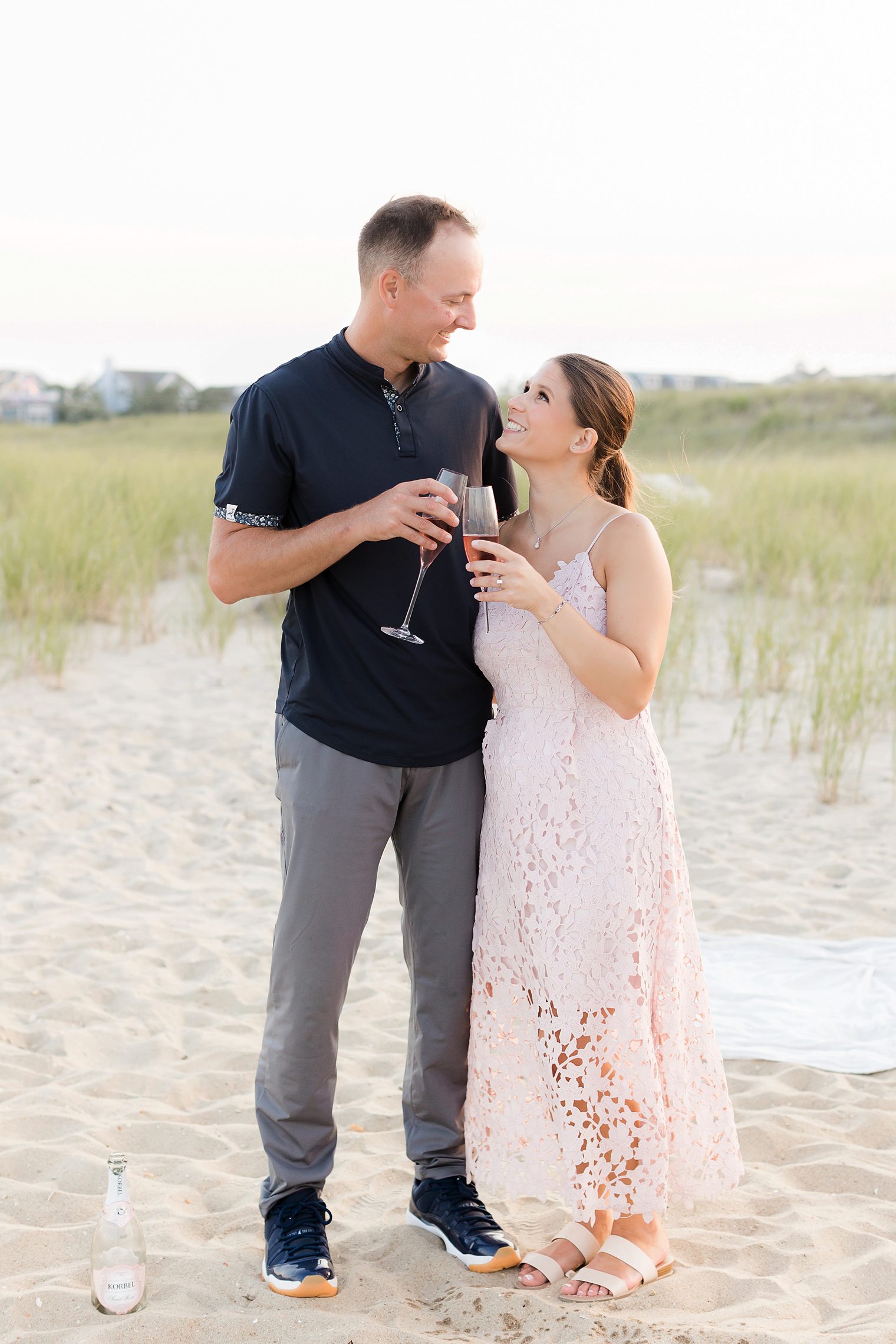 bride and groom making a toast for the engagement 