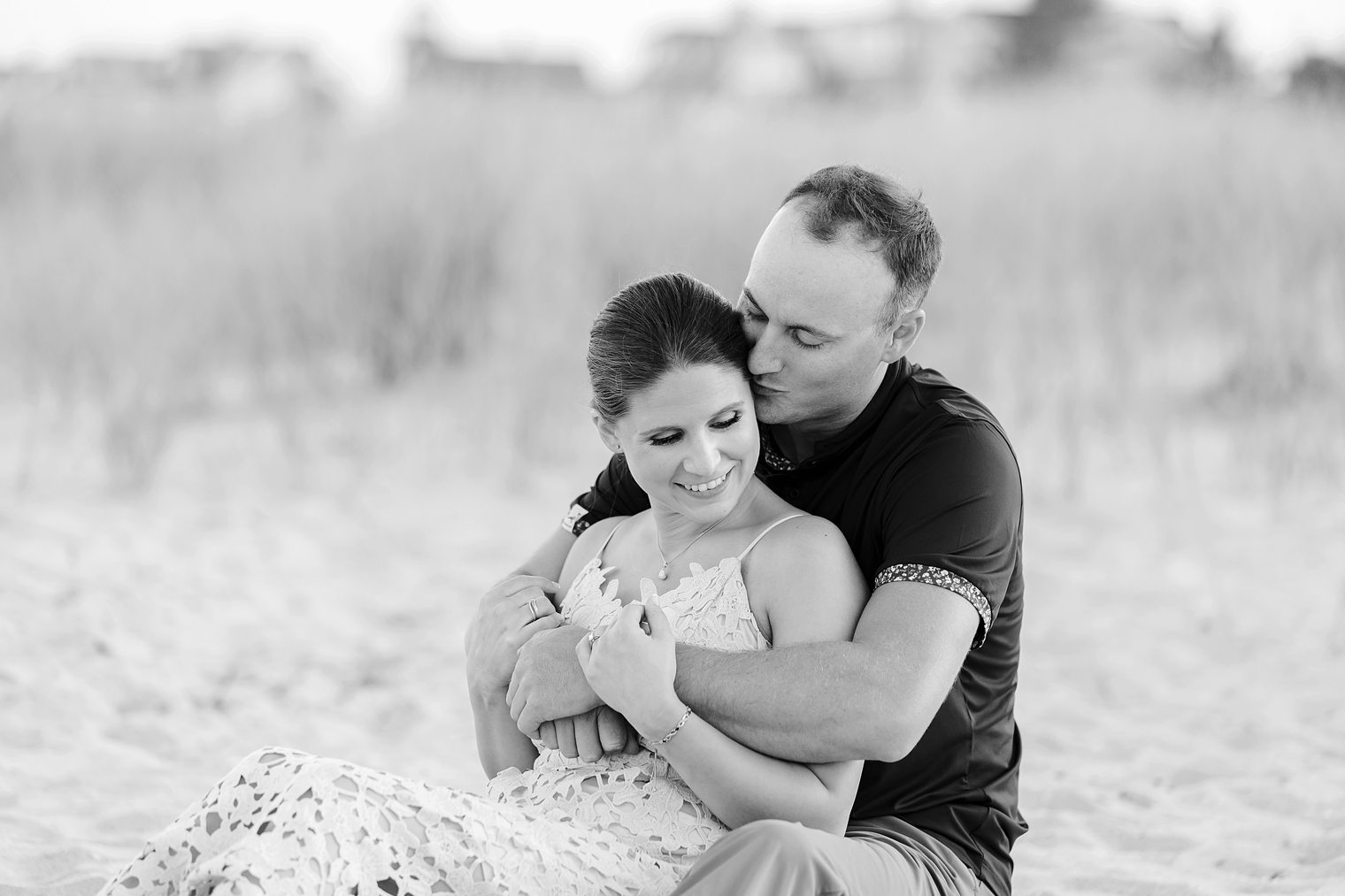 groom kissing her bride 