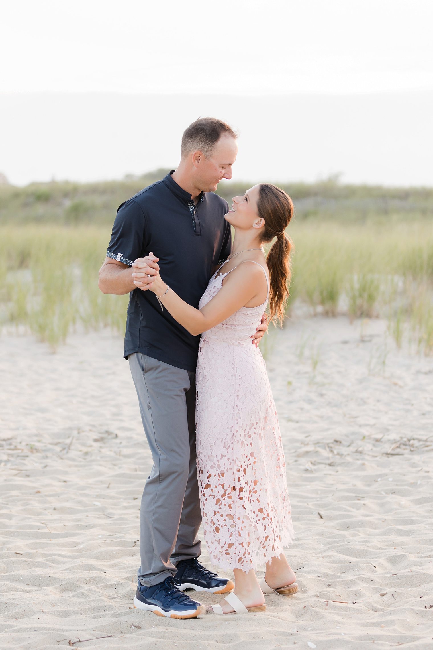 bride and groom dancing at the beach at Spring Lake 