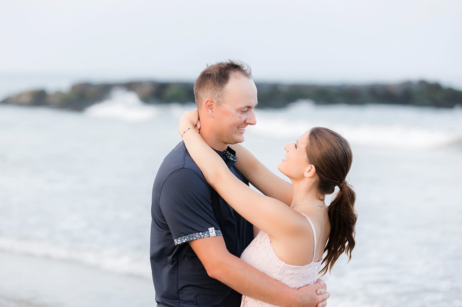 bride and groom looking each other with love