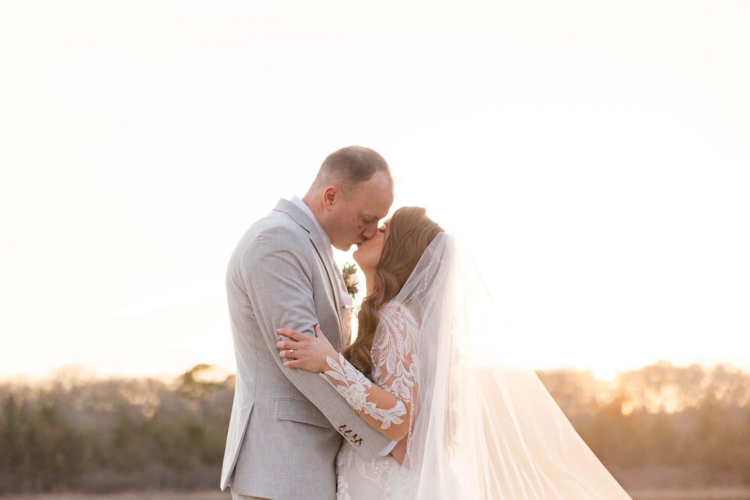 husband and wife kissing 