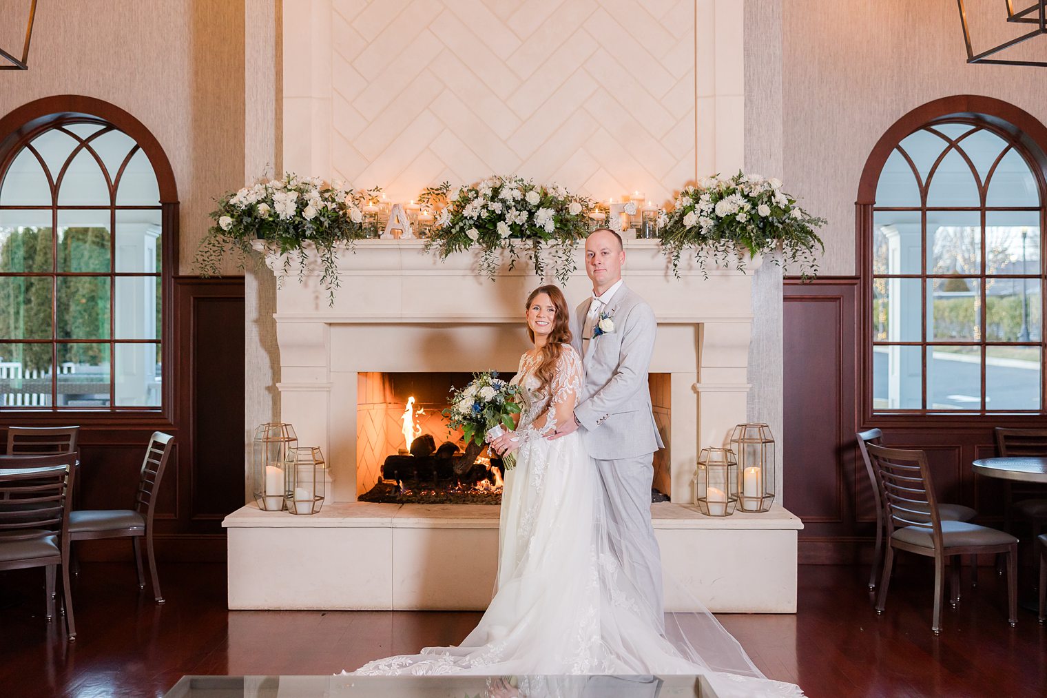 happy husband and wife posing for their wedding photos 