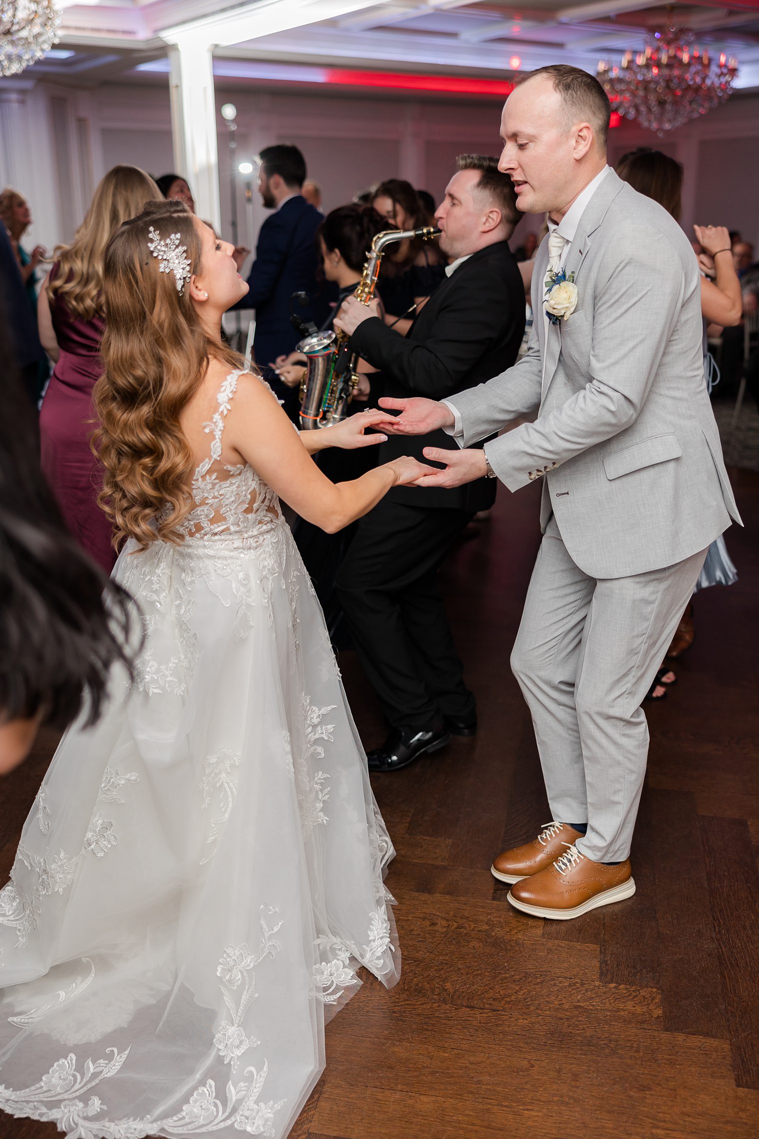 husband and wife dancing and enjoying their night 