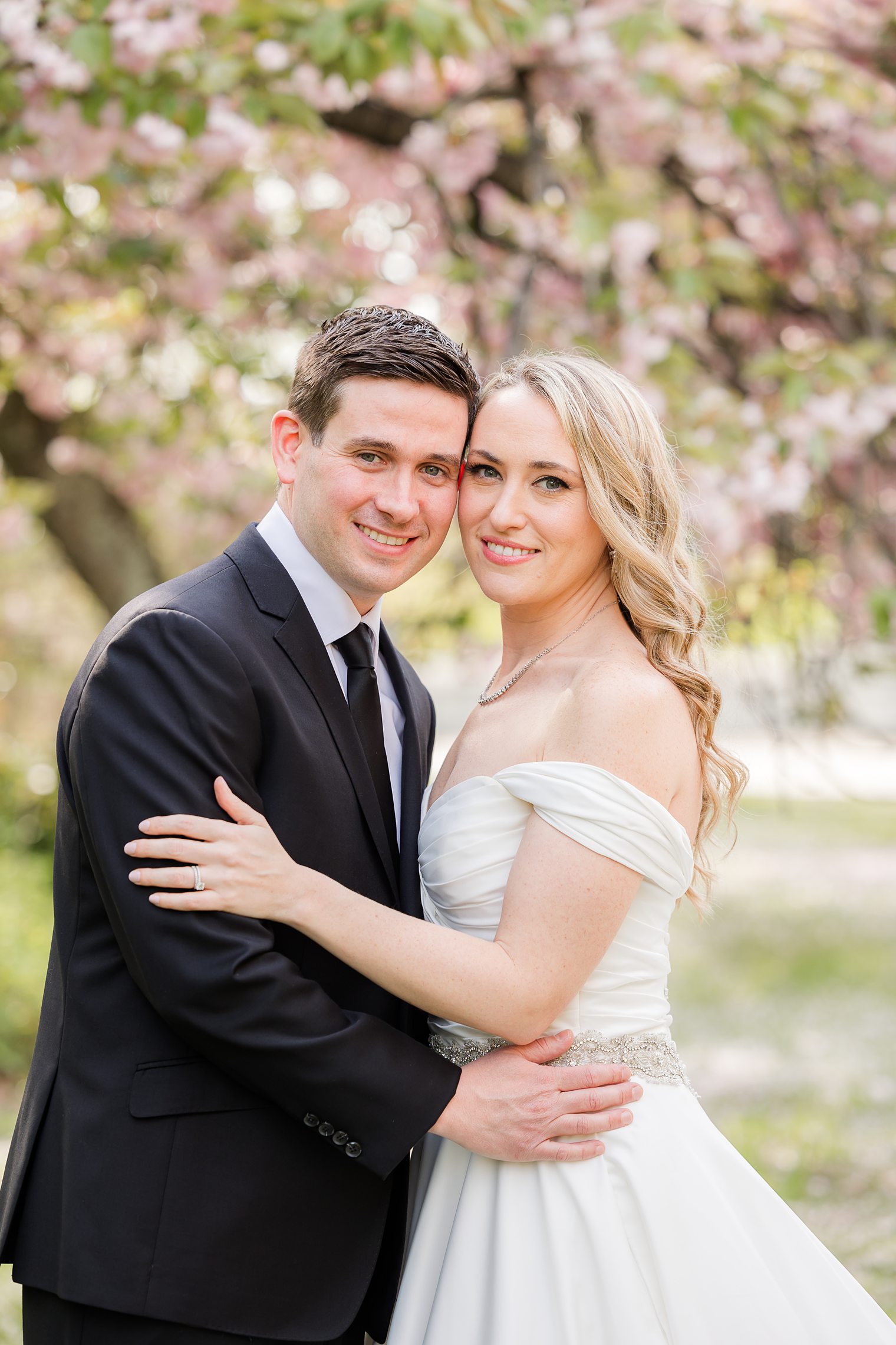 husband and wife posing for the camera 