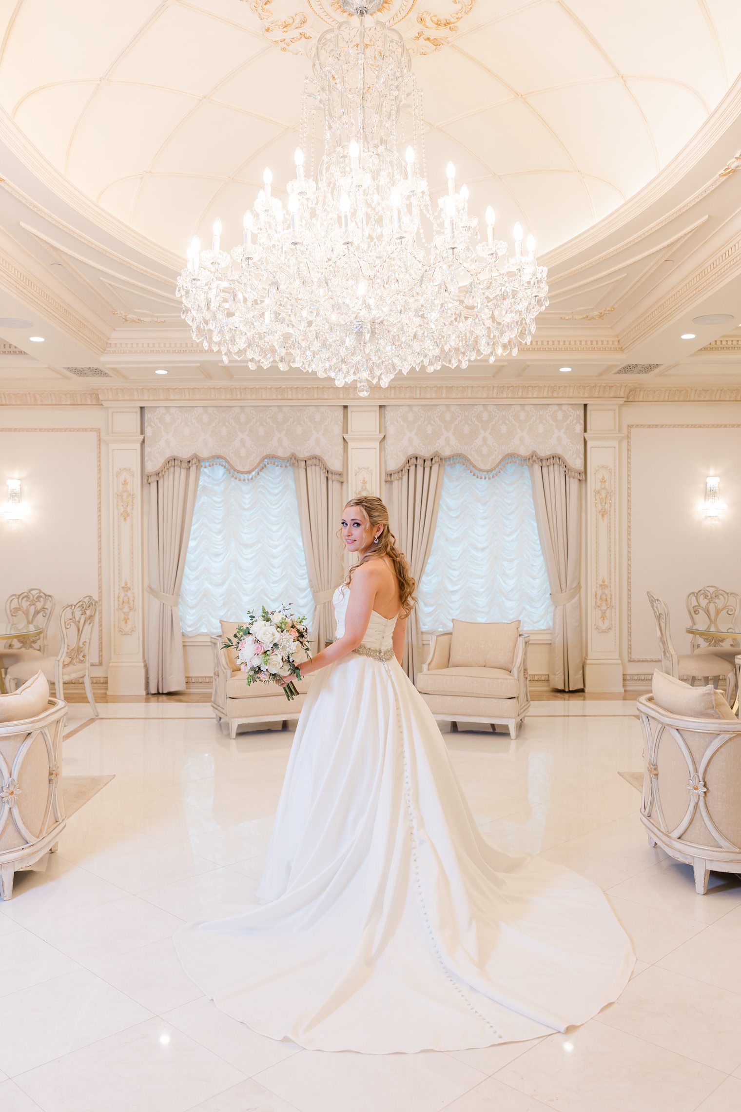 wife having her moment to show off her wedding dress 