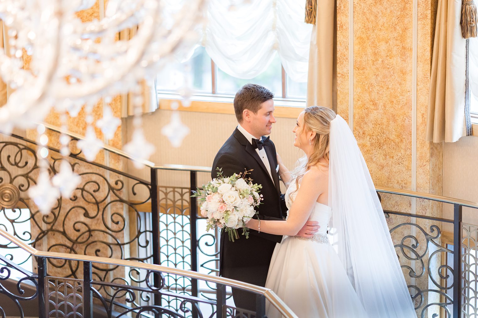 husband and wife face to face while posing 