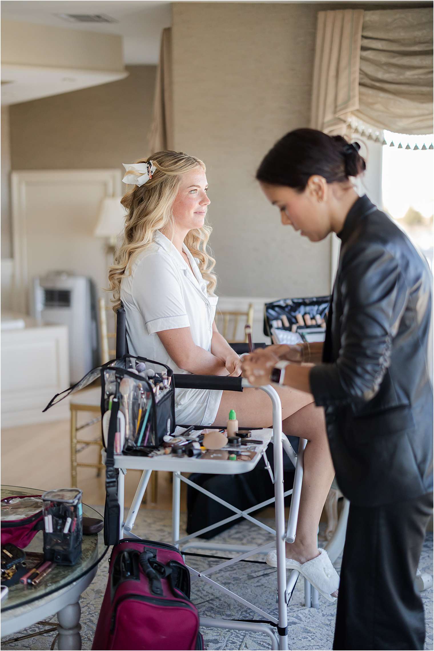 bride getting her makeup done