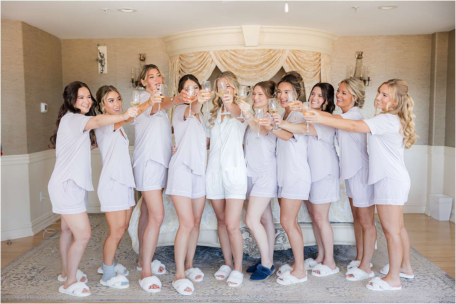 bride toasting with her bridesmaids