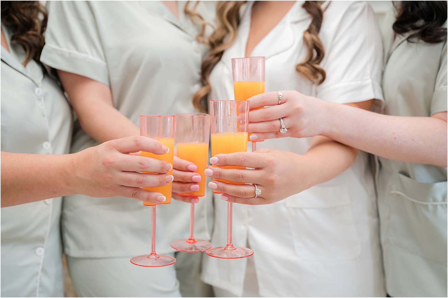 bride with her bridesmaids