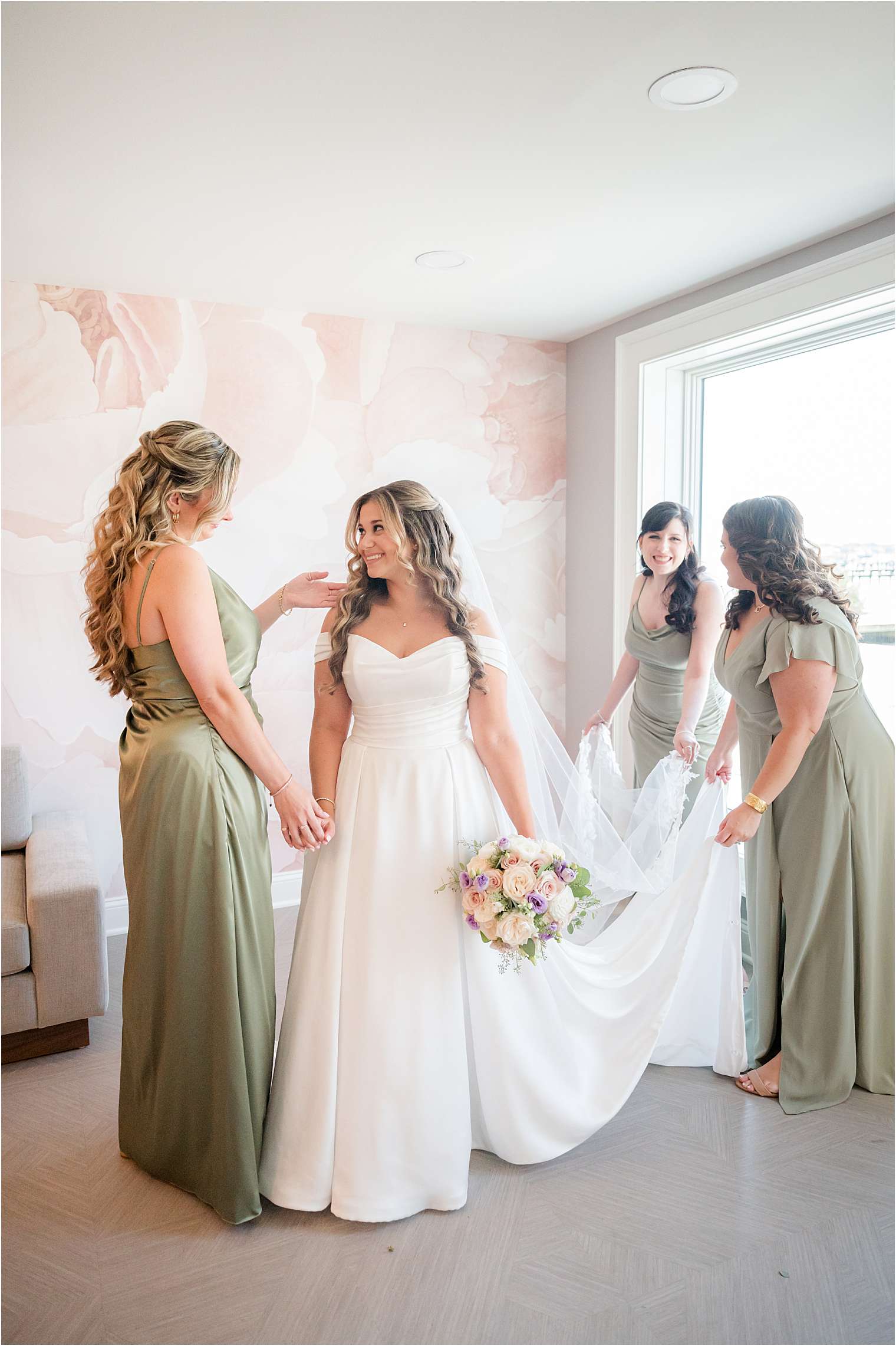 bride with her bridesmaids