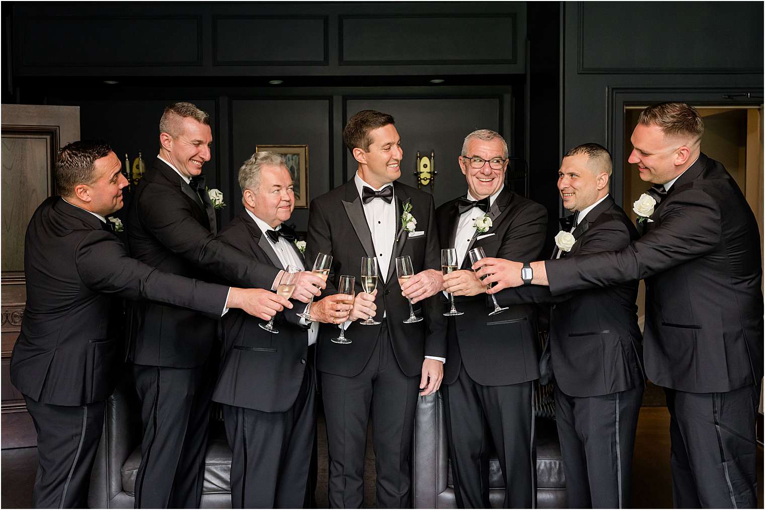 groom celebrating with his groomsmen