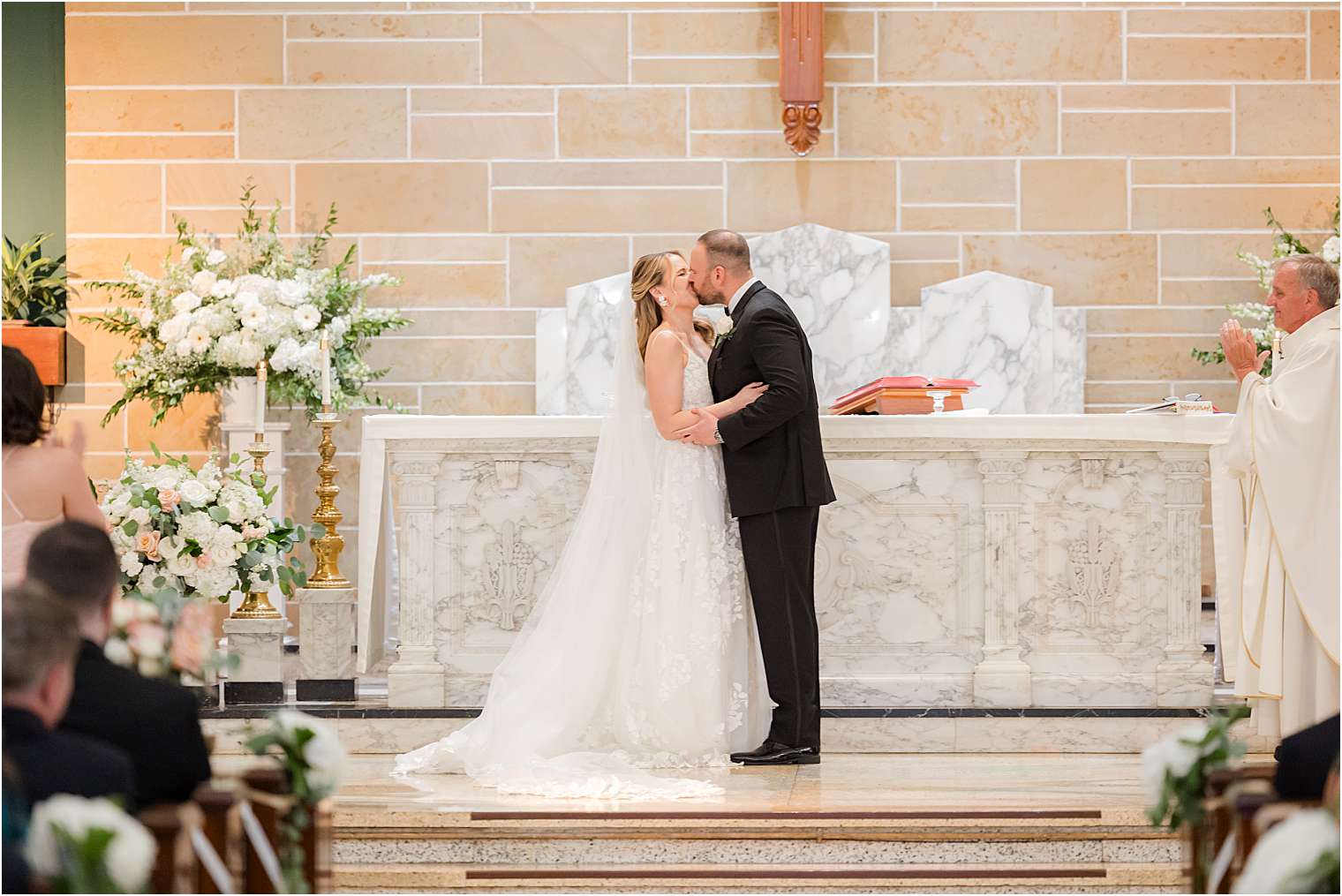 husband and wife kissing 