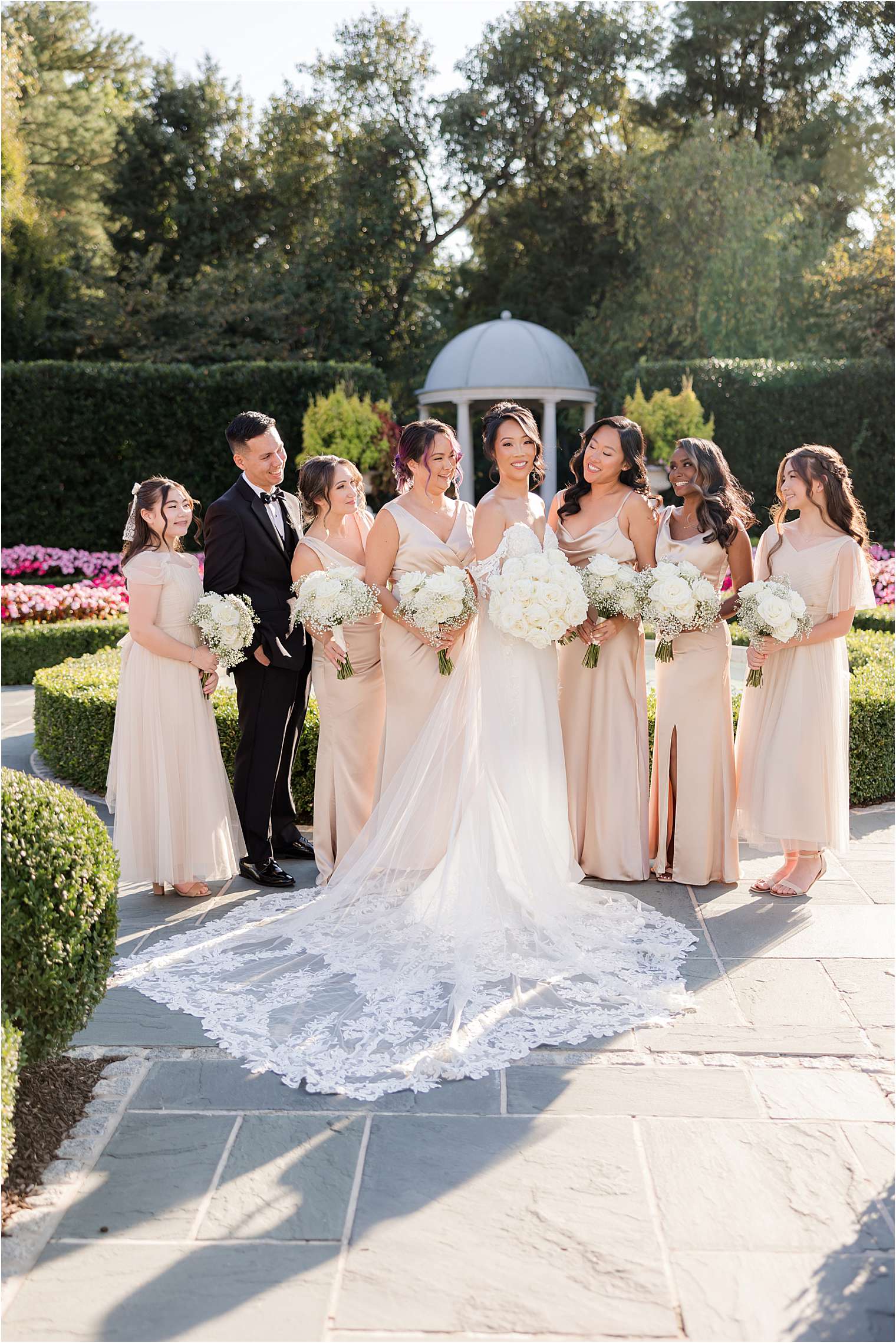 Bride posing with her bridesmaids