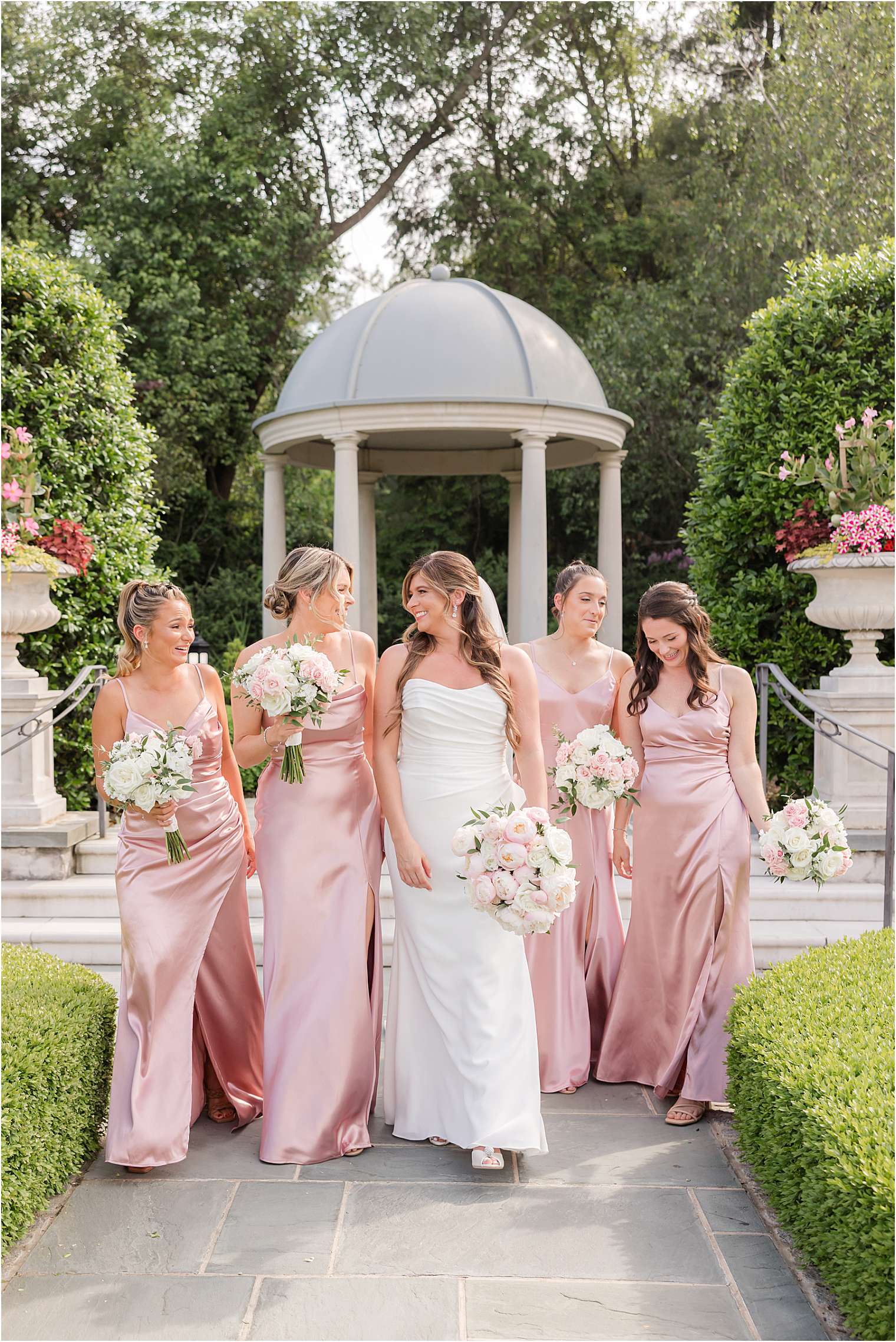 Bride posing with her bridesmaids